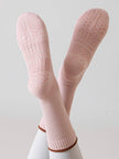 Pink Lian Loungewear Pilates compression socks for women with non-slip grip, arch support, and tight fit for stability during yoga and barre.