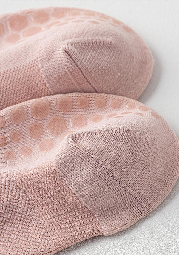 Pink Lian Loungewear Pilates compression socks for women with non-slip grip, arch support, and a tight fit for stability during yoga.