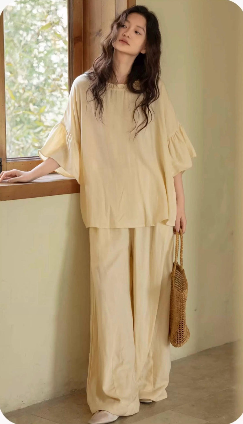 Butter yellow bamboo lounge set with ruffle sleeves from Lian Loungewear, featuring a comfortable, relaxed-fit loungewear ensemble.