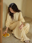 Butter yellow bamboo lounge set by Lian Loungewear with ruffle sleeves, featuring a comfortable, stylish loungewear outfit.