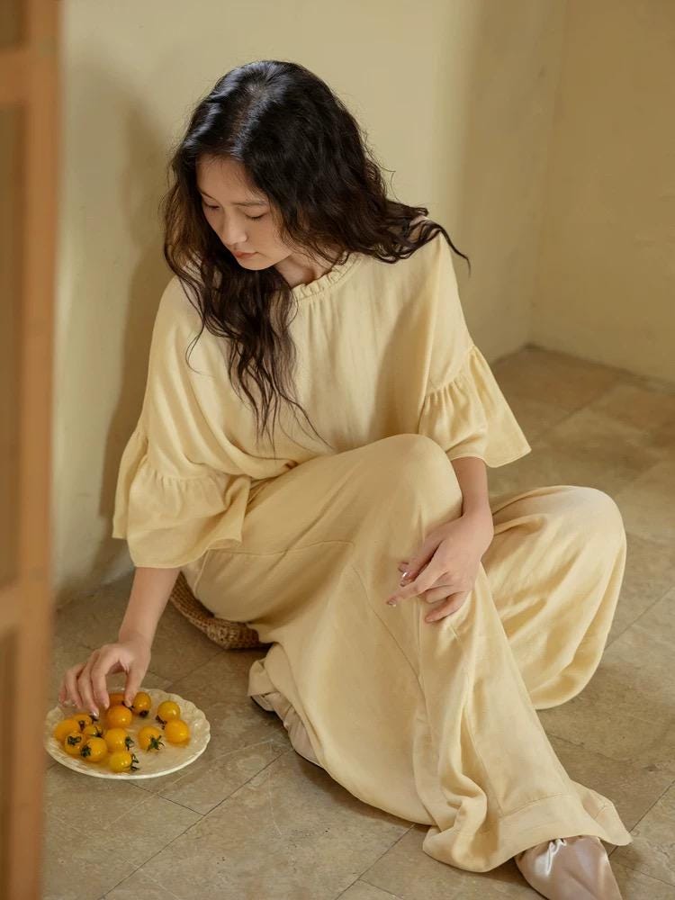 Butter yellow bamboo lounge set by Lian Loungewear with ruffle sleeves, featuring a comfortable, stylish loungewear outfit.
