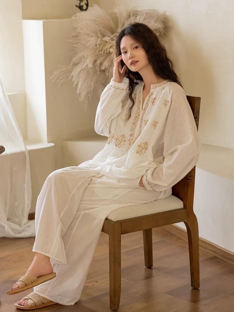 Lian Loungewear embroidered cotton pajamas set with a loose fit, soft breathable fabric, suitable for sleep or lounging.