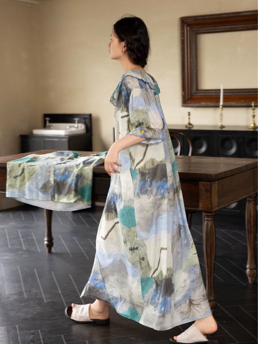 Lian Loungewear watercolour tie dye bamboo cotton pajamas set or dress displayed on a hanger with vibrant pastel patterns.