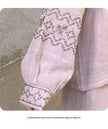 Lian Loungewear gauze cotton pajama set with embroidered sleeves, featuring soft, breathable fabric and relaxed fit for comfortable sleepwear.