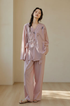 Hand-embroidered bamboo cotton kimono-style pajama set by Lian Loungewear, featuring a wrap design and intricate embroidery.