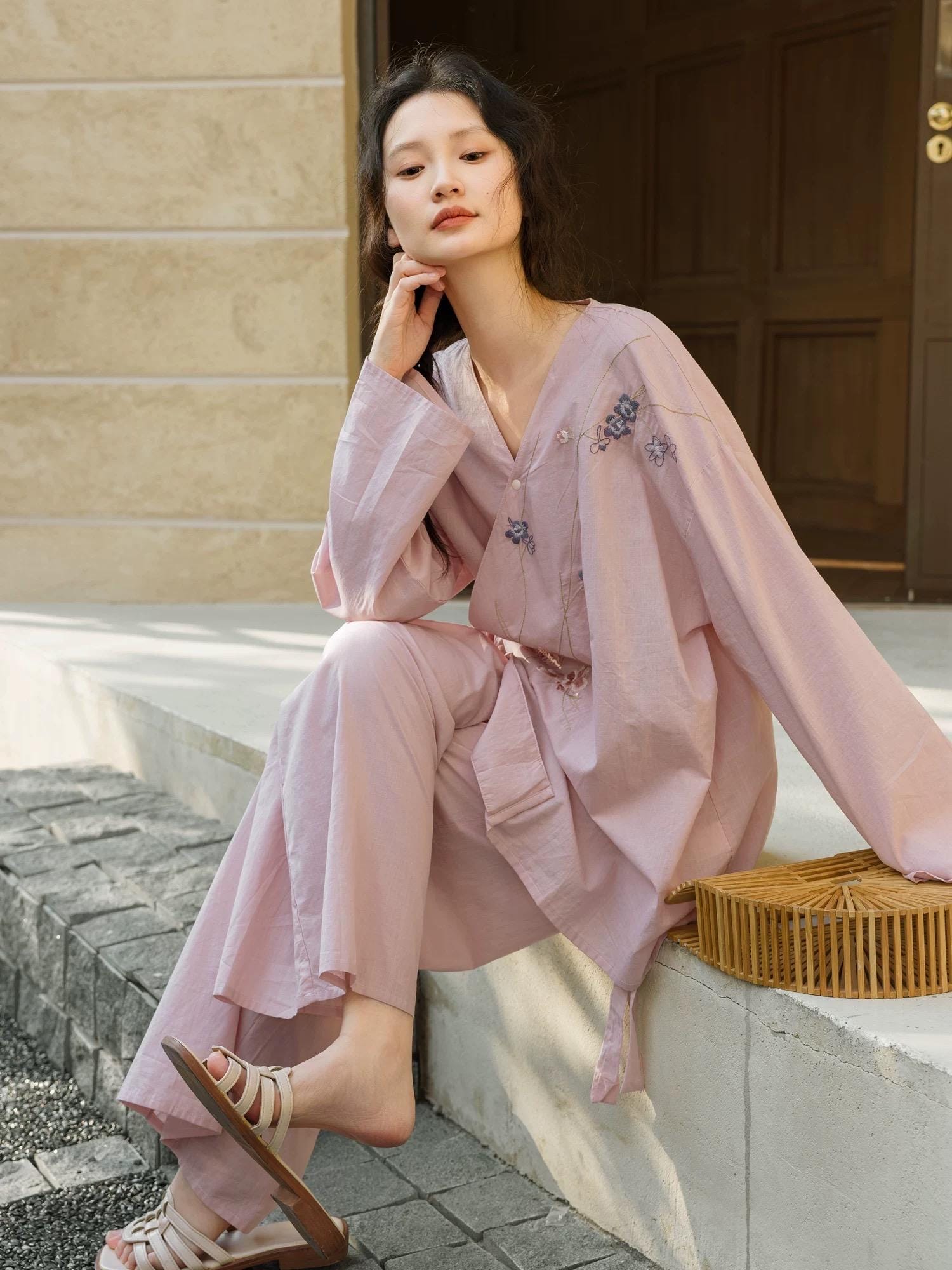 Hand-embroidered bamboo cotton pajama set in kimono style wrap by Lian Loungewear, featuring intricate embroidery and soft fabric.