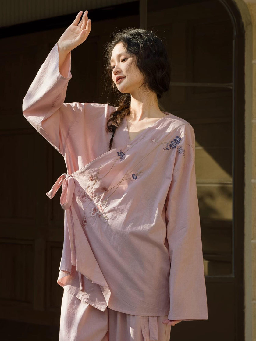 Hand-embroidered bamboo cotton kimono-style pajama set by Lian Loungewear, featuring intricate embroidery and comfortable wrap design.