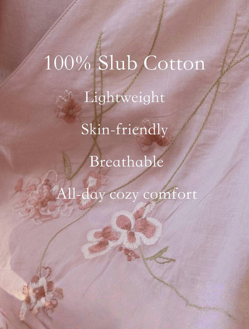 Hand-embroidered bamboo cotton kimono-style pajama set by Lian Loungewear, featuring comfortable wrap design and intricate embroidery.