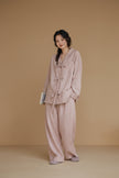 Pink cotton gauze pajama set by Lian Loungewear featuring a relaxed fit, soft fabric, and comfortable design for lounging or sleep.