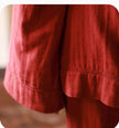 Organic gauze cotton pajama set by Lian Loungewear in muted red, featuring round collar, perfect for Christmas loungewear or gifts.