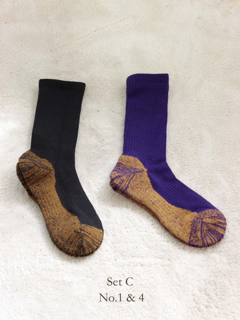 Lian Loungewear Merino wool thermal slipper socks gift pack for men and women, cushioned terry lined alpaca socks in various sizes.