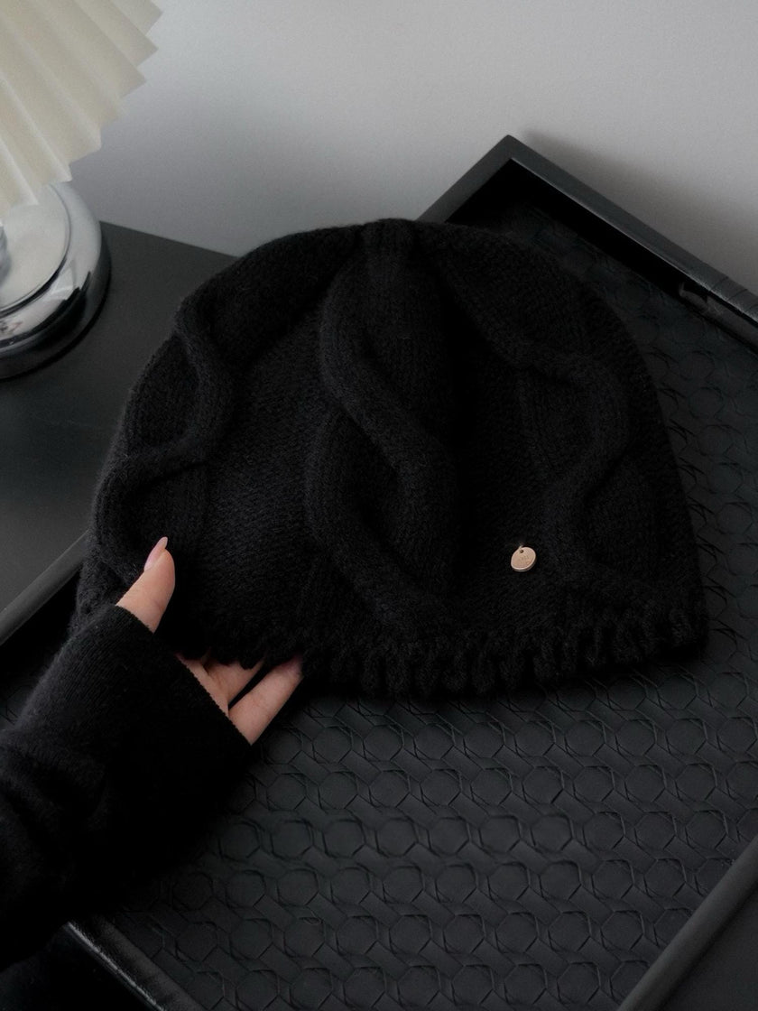 Wine red 100% Merino wool cable knit beanie for women, soft and warm winter hat with a snug fit and cozy knitted design.