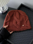 Wine red 100% Merino Wool cable knit beanie by Lian Loungewear, soft and warm winter hat for women with a cozy knitted design.